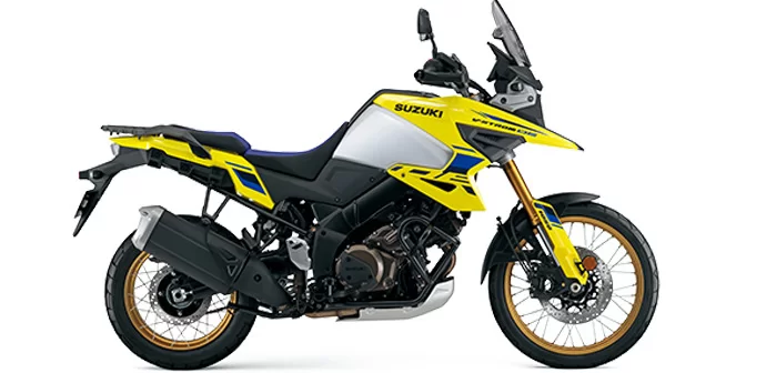 Gele Suzuki V-Strom in witte studio